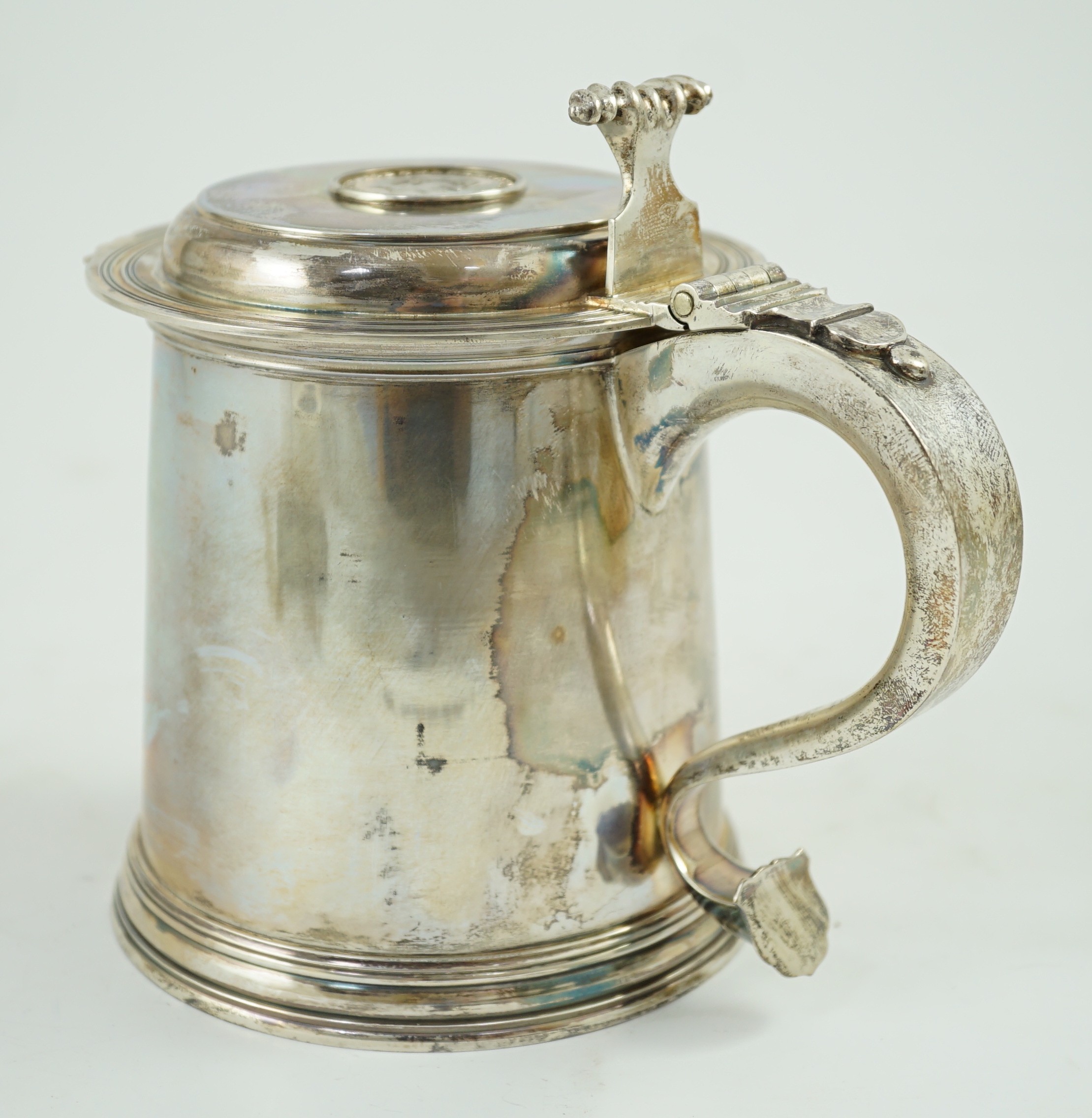 An Elizabeth II limited edition silver tankard, to commemorate the investiture of Charles as Prince of Wales at Caernarvon Castle, 1st July, 1969, Wakely & Wheeler, London, 1969